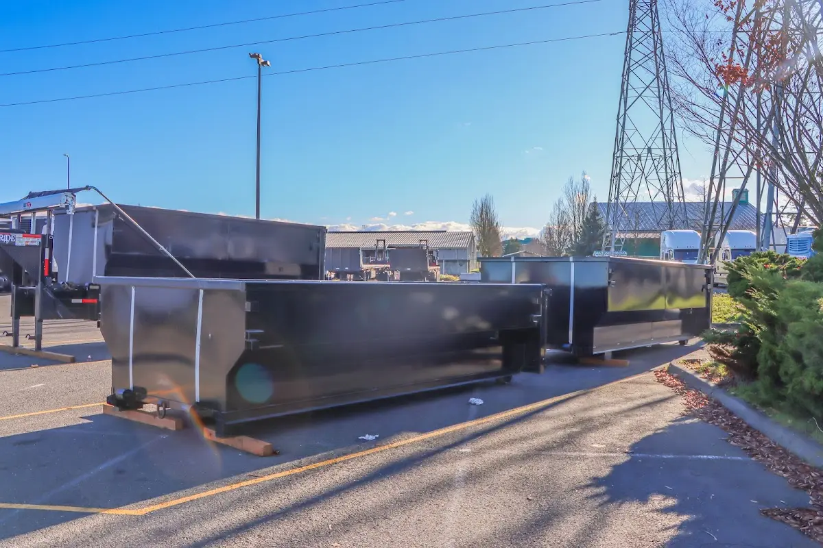 Roll-off dumpster ready for waste disposal at job site for Yard Waste Dumpster Rental in Prairieville